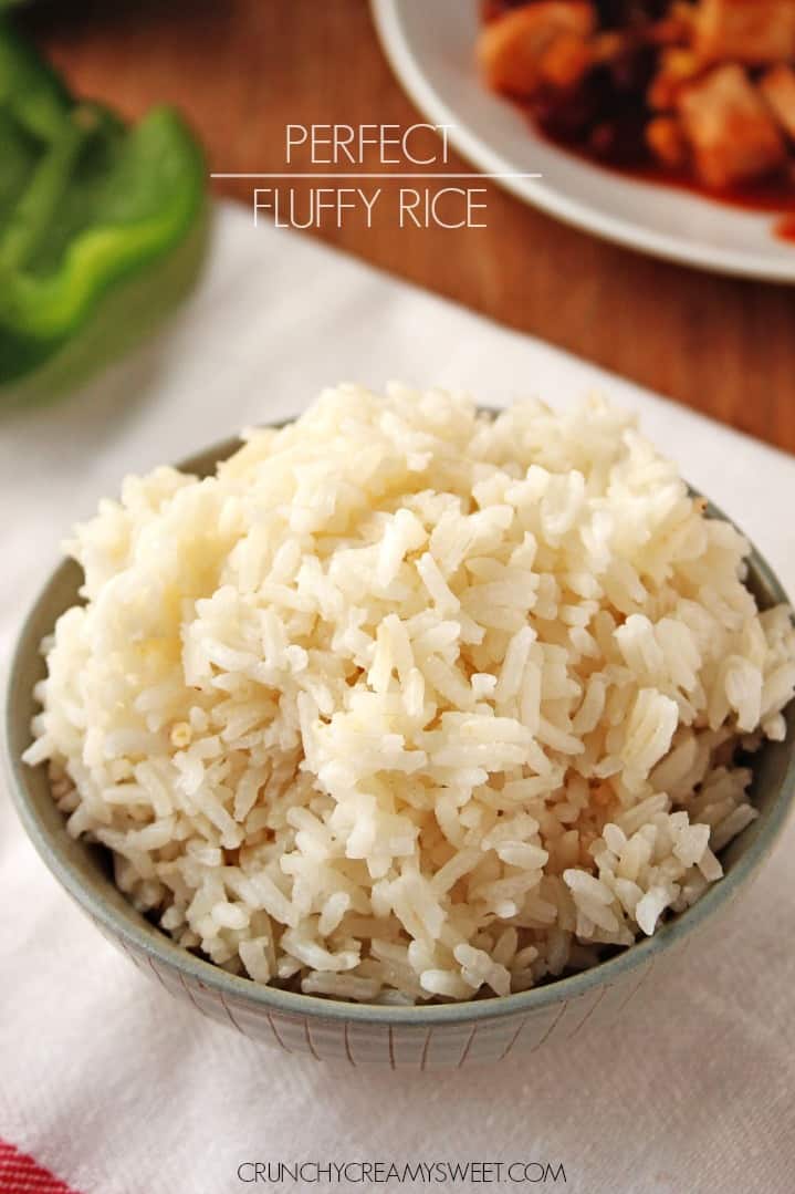 Side shot of cooked rice in a gray bowl. 