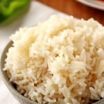 Cooked rice in a gray bowl.