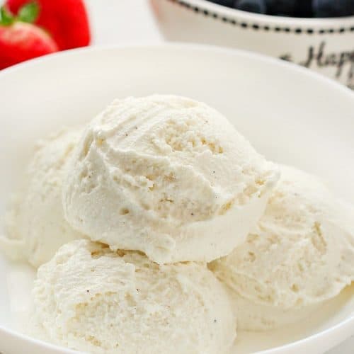 Whipped milk ice cream in a white bowl.