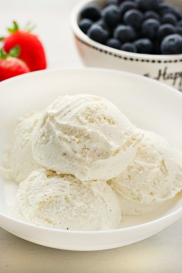 Whipped milk ice cream in a white bowl.