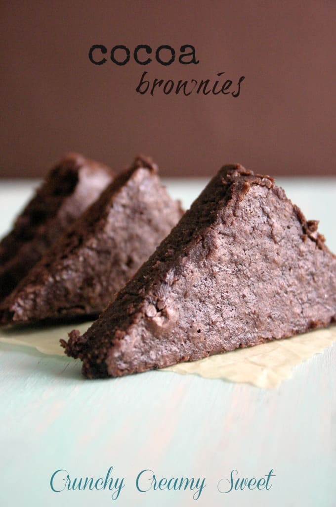 Brownies cut into triangles standing next to each other.