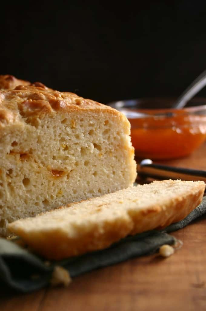 Side shot of sweet bread with apricot jam.