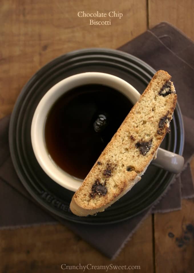 Chocolate Chip Biscotti on top of coffee cup.