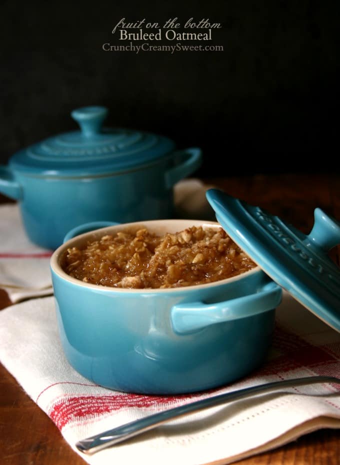 Side shot of baked oatmeal in ramekins with lids.