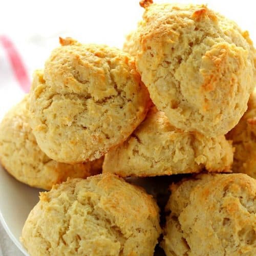 Drop Biscuits stacked on plate.