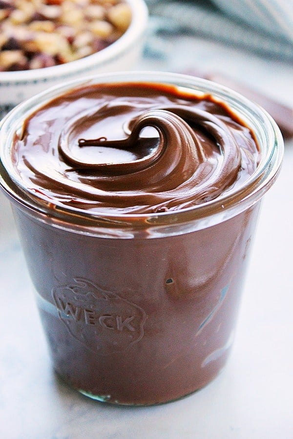 Homemade Nutella in a glass jar.