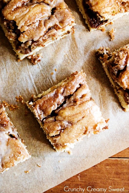 Overhead shot of cinnamon roll cake squares.