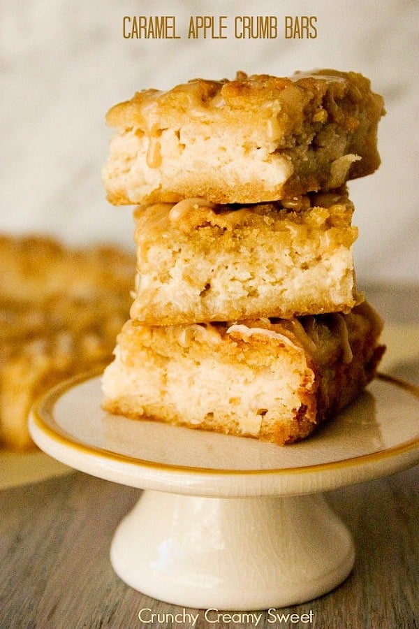 Caramel Apple Crumb Bars stacked on small cake stand.