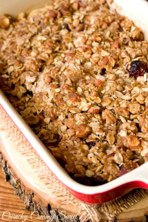 Side shot of apple crisp in baking dish.