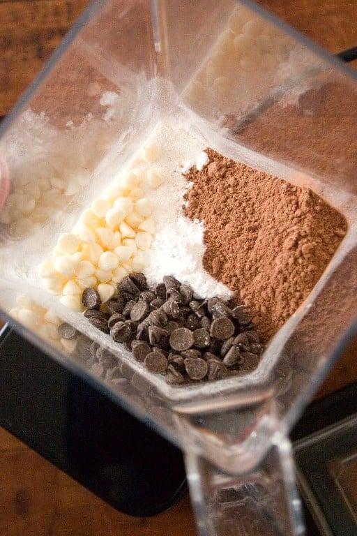 Overhead shot of ingredients in blender for homemade hot chocolate mix.