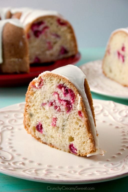 Festive bundt cake made with cranberries and dressed up with white chocolate glaze.