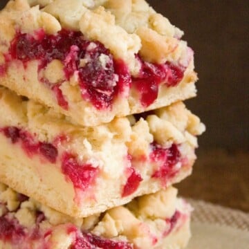Festive crumb bars for holidays with cranberry jam and white chocolate.