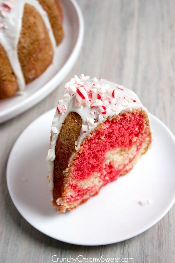 Peppermint Candy Cane Bundt Cake - sweet and light peppermint cake with red swirl is festive and perfect for the holidays! 