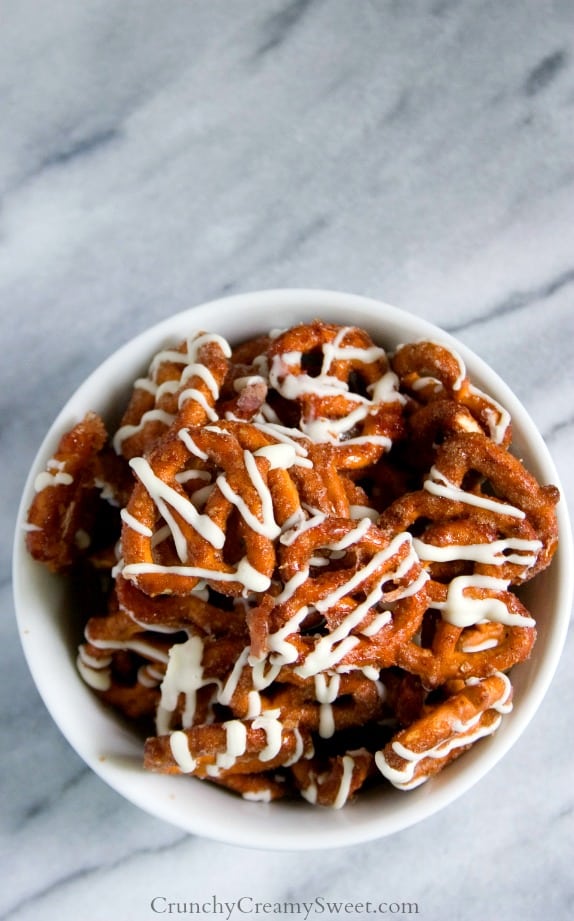 Cinnamon Roll Pretzels - cinnamon sugar coated pretzels with white chocolate drizzle