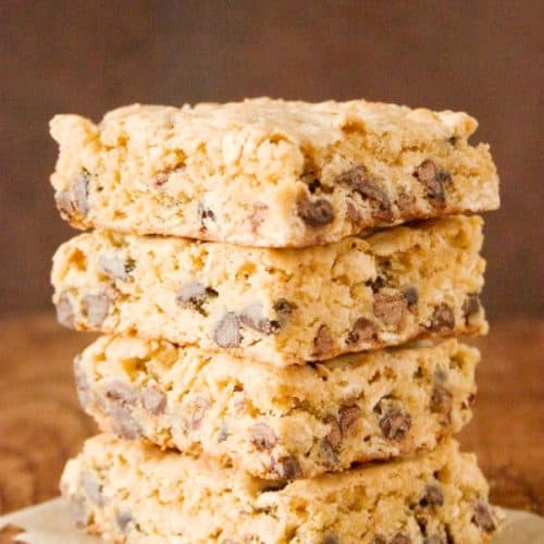 Peanut Butter Chocolate Oatmeal Bars stacked up on each other.