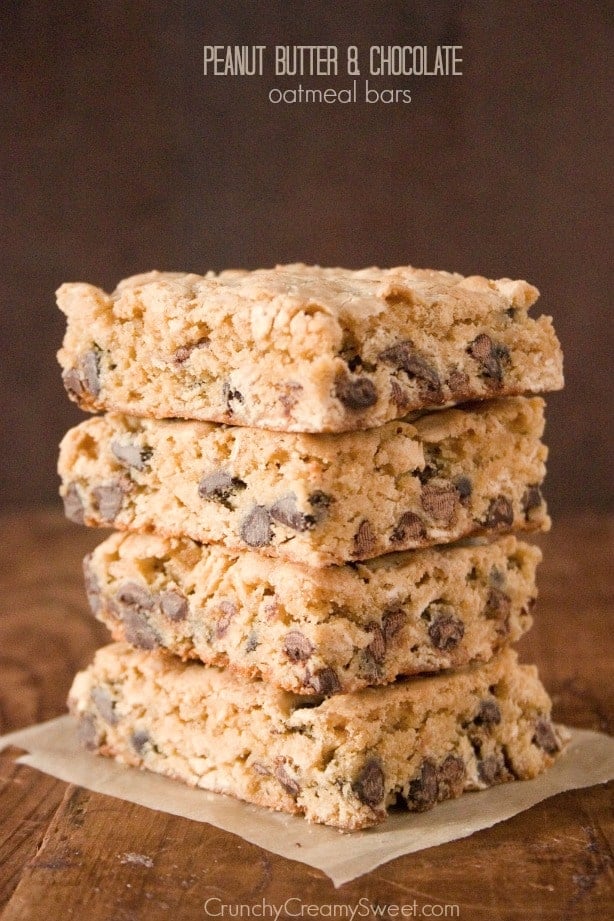 Side shot of peanut butter oatmeal bars stacked up on each other.