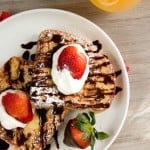 French toast with chocolate sauce and strawberries