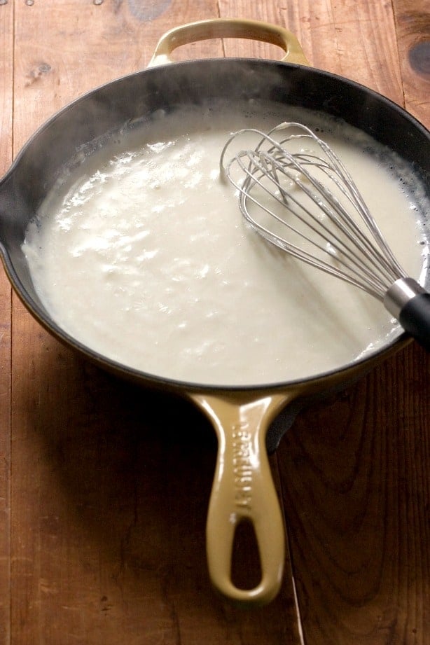 White sauce for Pepper Jack mac and cheese in skillet.