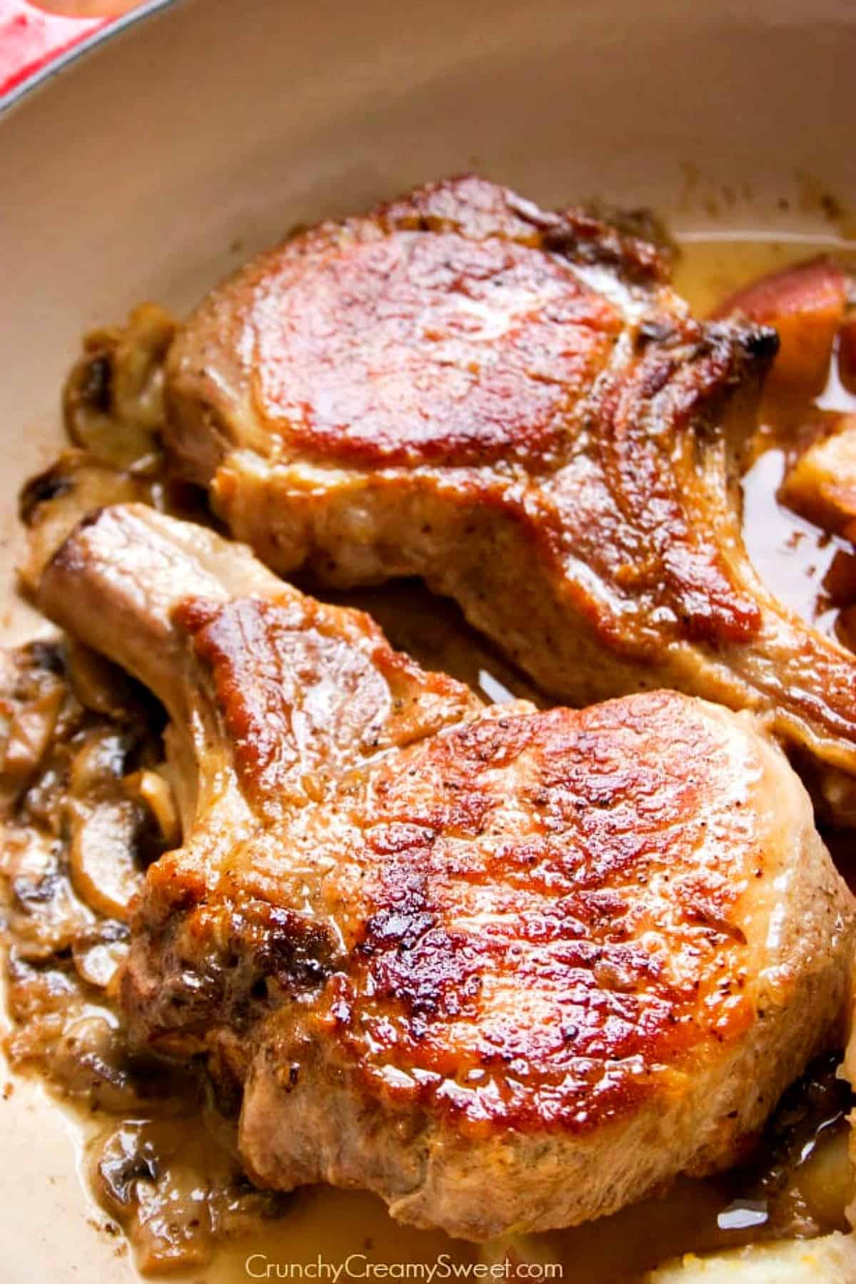 Braised Pork Chops recipe Cooke pork chops in a skillet.