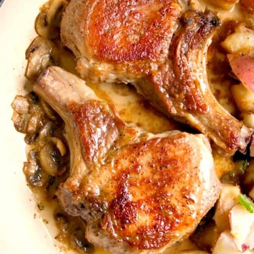 Pork chops in a pan.