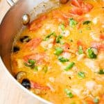 Chicken Marengo in a skillet.