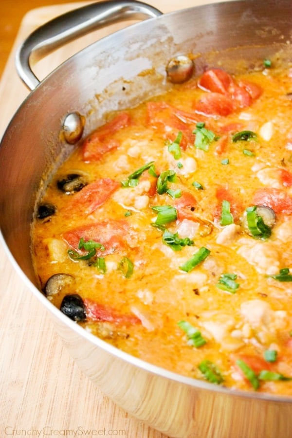 Chicken Marengo in a skillet.