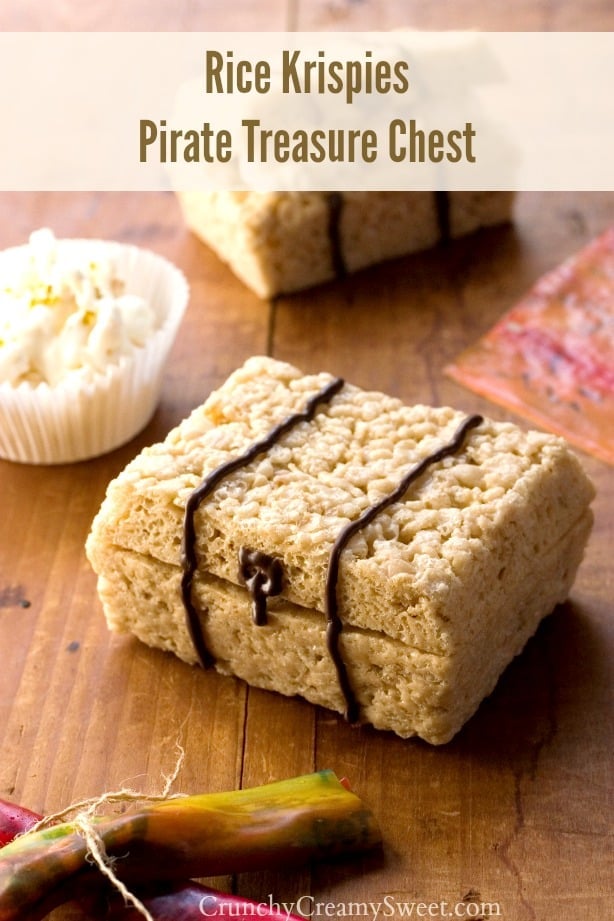 Rice Krispies Pirate Treasure Chest - easy step by step instructions to make a pirate chest our of rice krispies treats, filled with popcorn and fruit leather map. Really easy food craft for a pirate theme birthday party! Side shot of a pirate treasure chest made out of rice krispies treats.