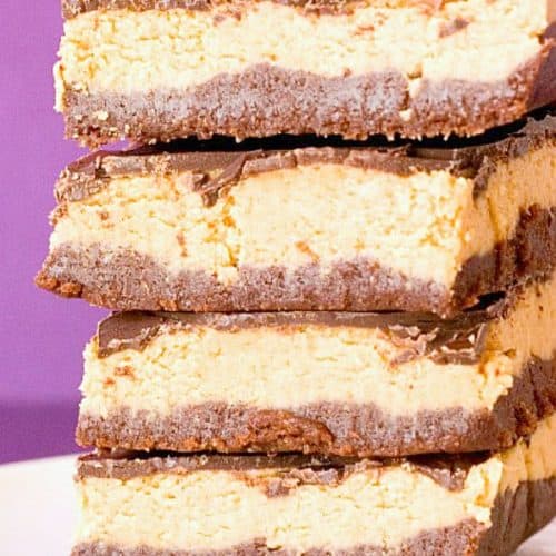 Peanut Butter Brownie Truffle Bars stacked up.