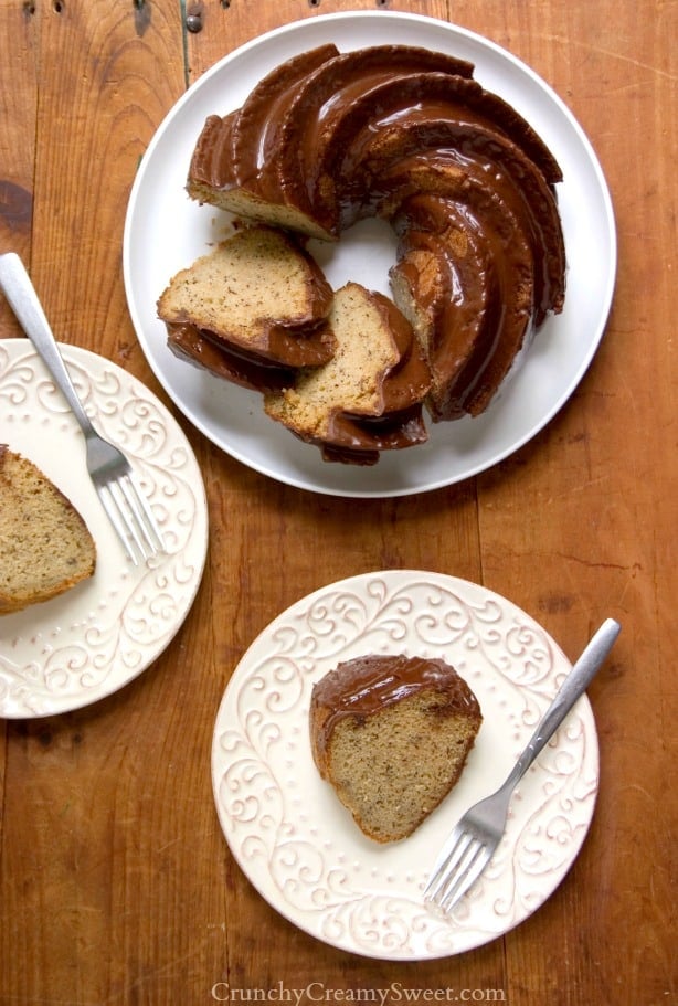 Banana Bundt Cake on a plate with slices on small plates.