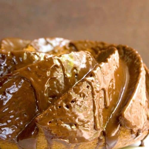 Banana Bundt Cake with Chocolate Glaze on a plate.