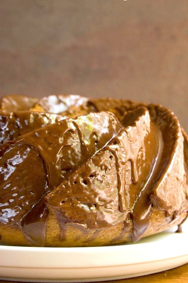 Banana Bundt Cake with Chocolate Glaze on a plate.