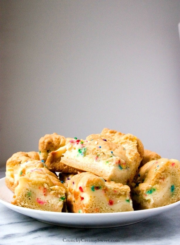 Sugar Cookie Bars with Funfetti Cheesecake Filling