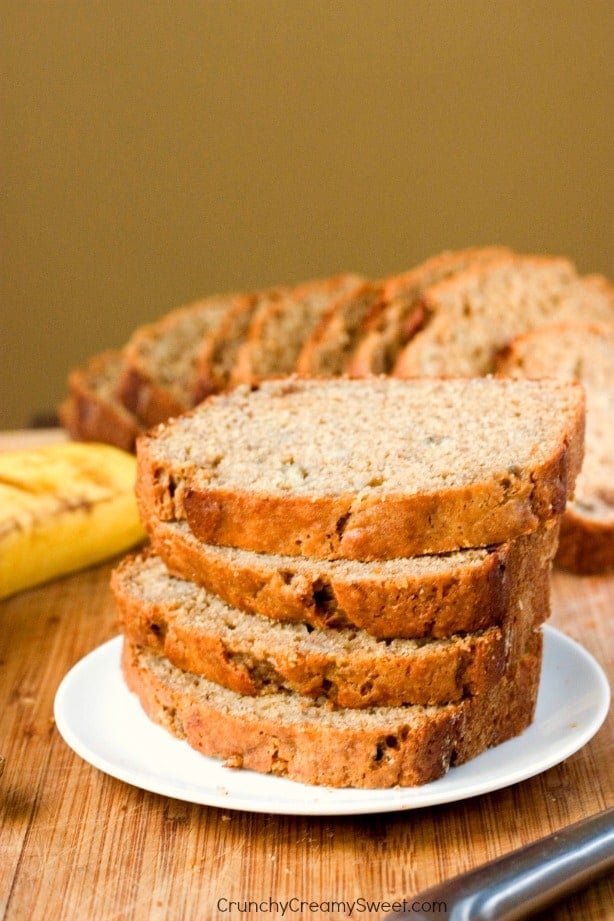 Whole Wheat Yogurt Banana Bread with Cinnamon - healthier version of your favorite quick bread! This banana bread is so good, it will be devoured quickly! Great way to use those overripe bananas!