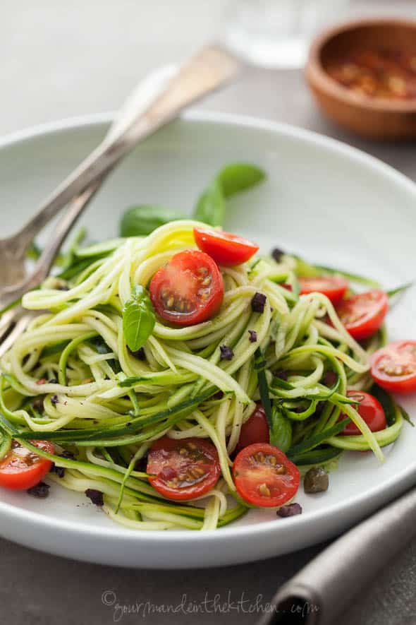 Zucchini Noodles with Caper Olive Sauce and Fresh Tomatoes gourmandeinthekitchen.com