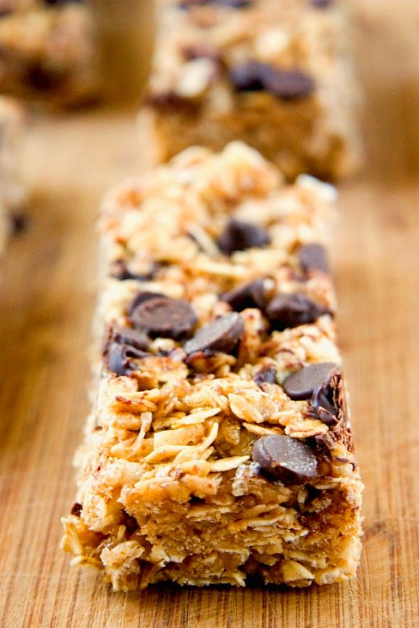 Chewy Peanut Butter Chocolate Chip Granola Bars in a row.