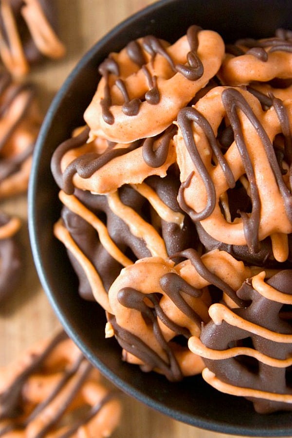 Pumpkin Spice Chocolate Covered Pretzels in a bowl.