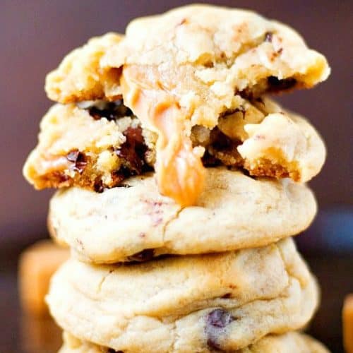 Caramel Stuffed Chocolate Chip Cookies stacked up.