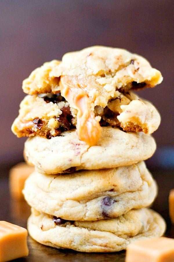 Caramel Stuffed Chocolate Chip Cookies stacked up.
