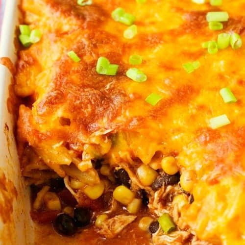 Cheesy Chicken Enchilada Pasta Bake in casserole dish.