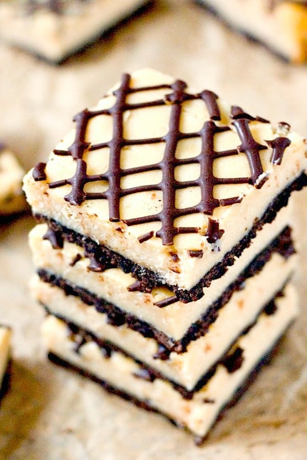 Peanut Butter Cheesecake Bars stacked up