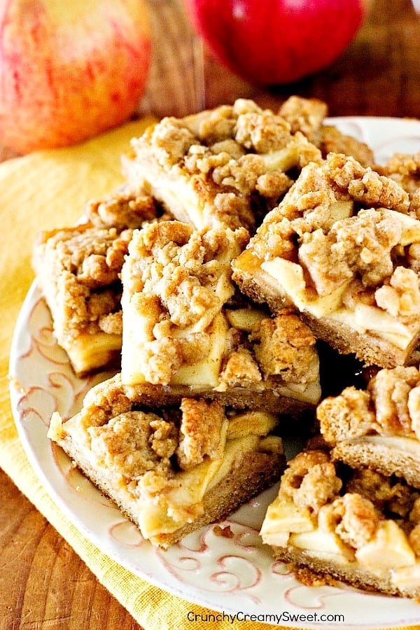 Apple Pie Bars arranged on a plate.