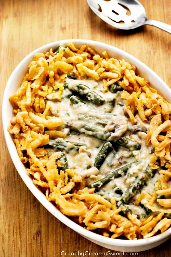 Overhead shot of green bean casserole in white oval dish.