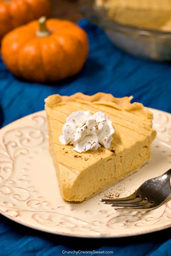 Pumpkin Mousse Pie slice on a plate.