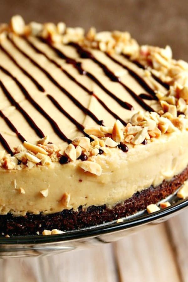 Peanut Butter Mousse Chocolate Cake on cake stand.