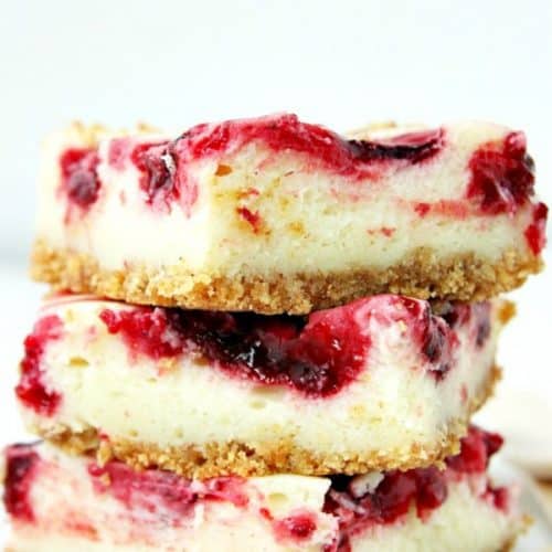 Stack of Lemon Raspberry Cheesecake Bars.