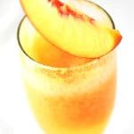 Frozen Peach Bellini in a glass.