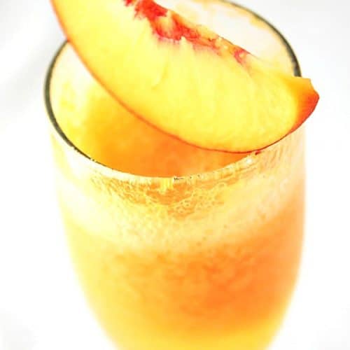 Frozen Peach Bellini in a glass.