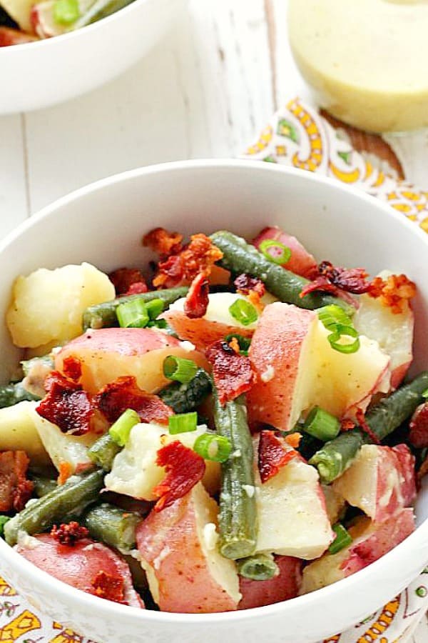 Potato Salad with Green Beans and Bacon in a bowl.