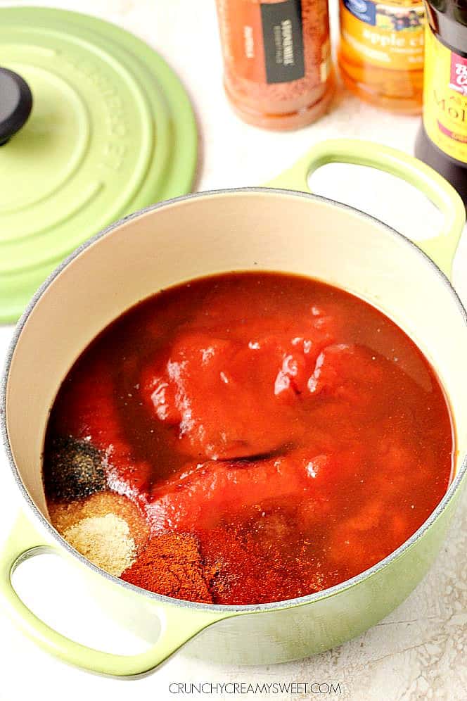 Side shot of BBQ sauce ingredients in a saucepan.