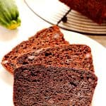 Slices of chocolate bread on white plate.